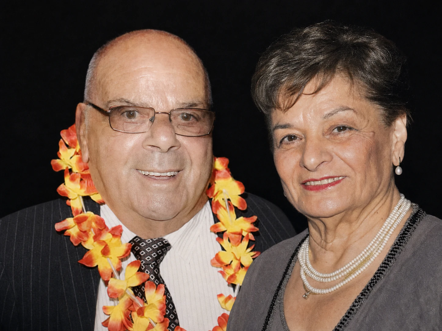 Rachel and Sam Inbari smiling together at a family celebration.